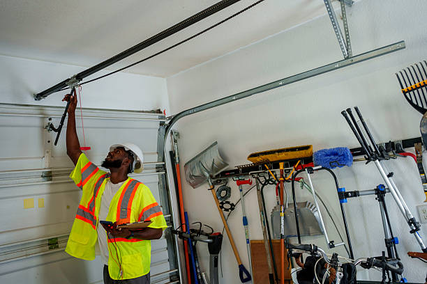 Professional Garage Door Panel Replacement technician working in Plain City, OH